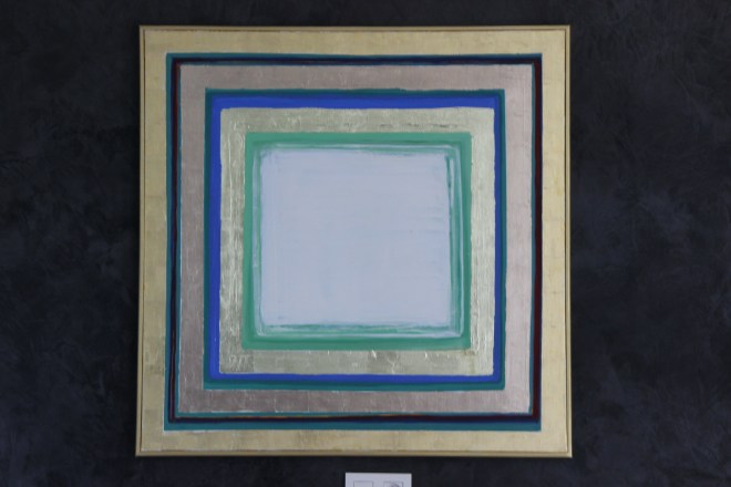 Opio Ice is just down the hall in the office on a black marble wall. Looks pretty good too me thinks We also hung Opio Ice this morning.